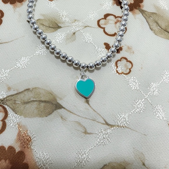 Tiffany & Co. Silver And Green Heart Bracelet - Picture 2 of 7
